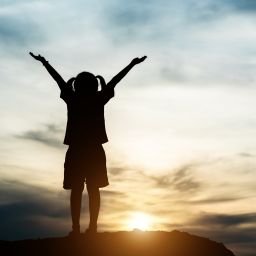 Silhouette of two girl having fun in nature
